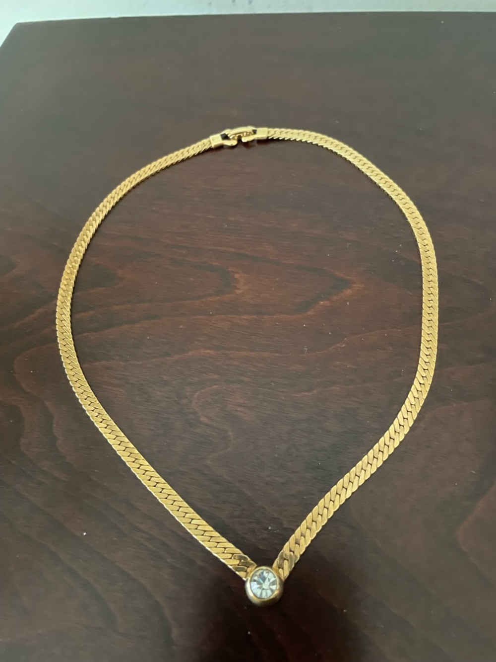 Goldtone curb chain with bezel set crystal necklace